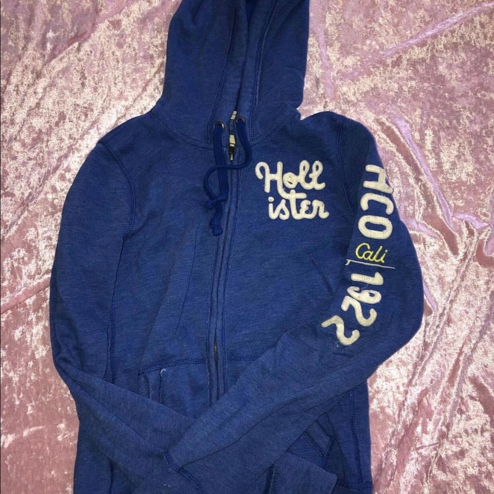 Zip up sweatshirt.